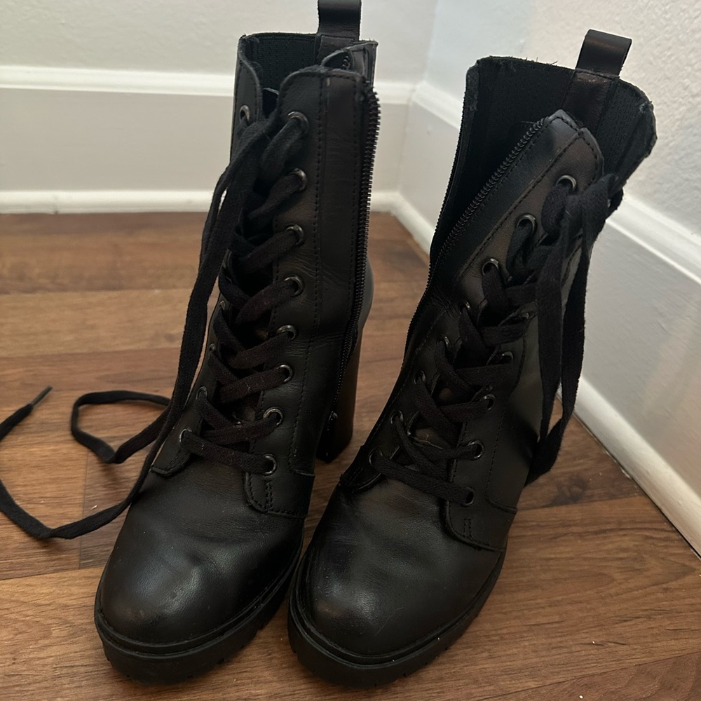 Black heeled lace up boots